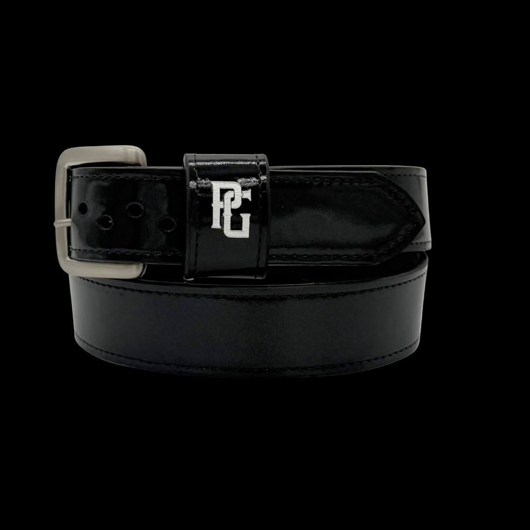 Black belt with silver buckle on a white background
